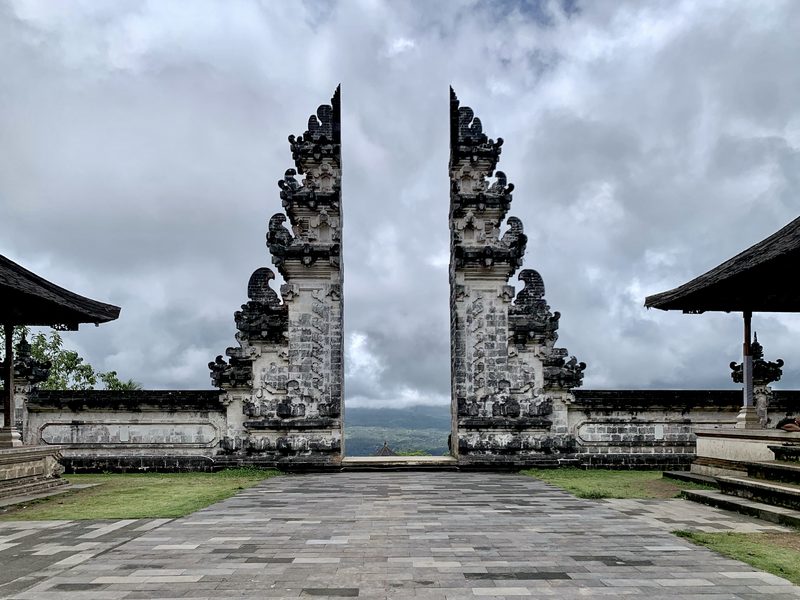 The Gate of Heaven at Pura Penataran Agung Lempuyang — the iconic split gate framing Mount Agung in the distance